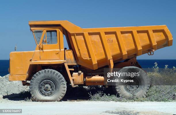 tipper truck - earth moving equipment - dump truck stock-fotos und bilder