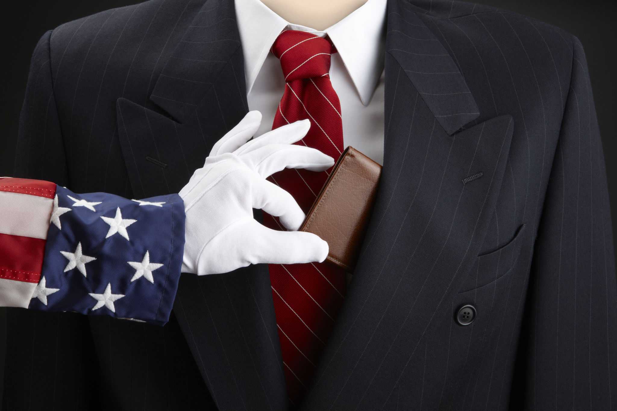 Uncle Sam picks businessman's pocket Uncle Sam picks businessman's pocket