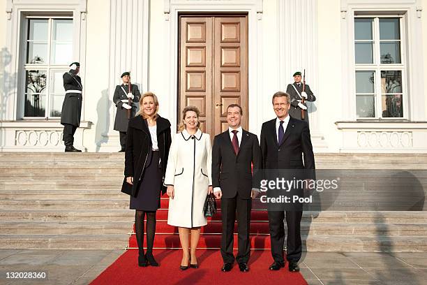In this photo provided by the German Government Press Office German President Christian Wulff and First Lady Bettina Wulff welcome Russian President...