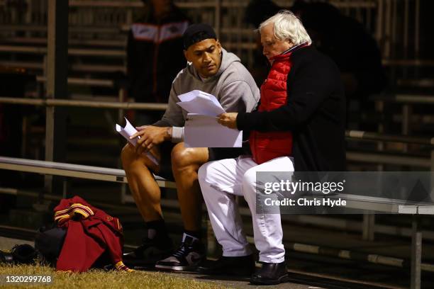 Clive Palmer and Israel Folau talk at Owen Park on May 27, 2021 in Gold Coast, Australia.