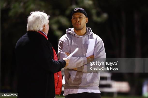 Clive Palmer and Israel Folau talk at Owen Park on May 27, 2021 in Gold Coast, Australia.