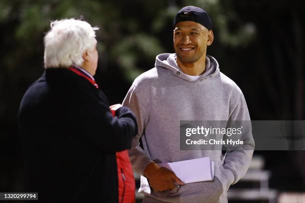 Clive Palmer and Israel Folau talk at Owen Park on May 27, 2021 in Gold Coast, Australia.