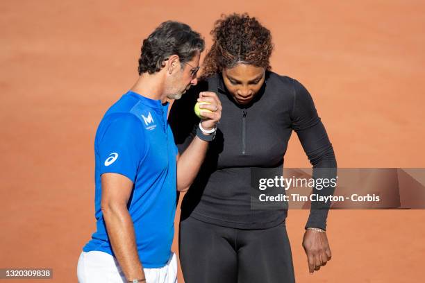 May 27. Serena Williams of the United States with coach Patrick Mouratoglou while practicing on Court Philippe-Chatrier in preparation for the 2021...