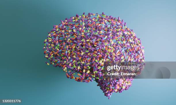 brain with pills - brain health stock pictures, royalty-free photos & images