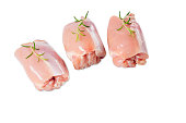 Chicken thigh fillet without bone and skinless, isolated .Raw chicken thigh without skin on a white background isolade. Three pieces of chicken.