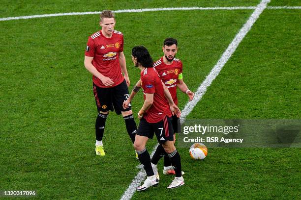 Edinson Cavani of Manchester United celebrates after scoring his sides first goal with Scott McTominay of Manchester United and Bruno Fernandes of...