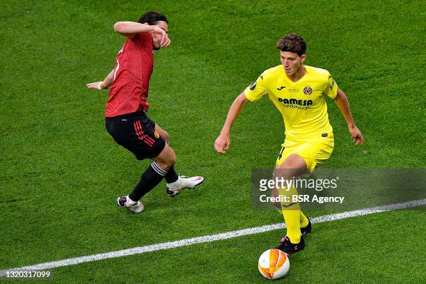 Edinson Cavani of Manchester United battles for posession with Pau Torres of Villarreal CF during the UEFA Europa League Final match between...