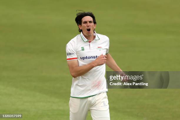 Chris Wright of Leicestershire reacts after being hit for a boundary during the LV= Insurance County Championship match between Leicestershire and...