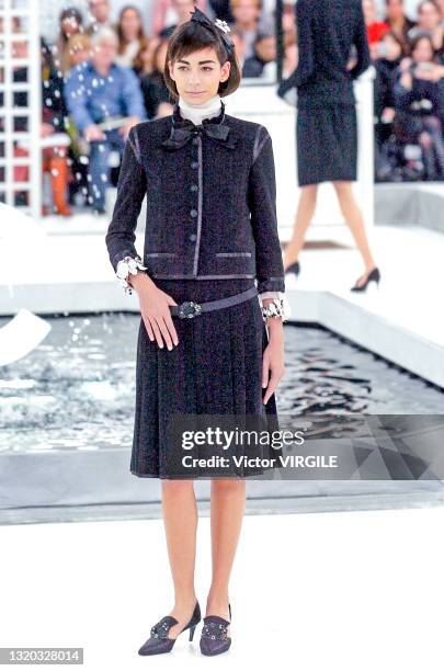 Model walks the runway during the Chanel Haute Couture Spring/Summer 2005 fashion show as part of the Paris Haute Couture Fashion Week on January 24,...