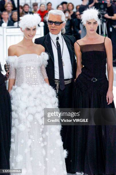 Erin Wasson and Karl Lagerfeld walk the runway during the Chanel Haute Couture Spring/Summer 2005 fashion show as part of the Paris Haute Couture...