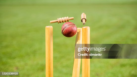Cricket ball hitting the stumps Cricket ball hitting the stumps