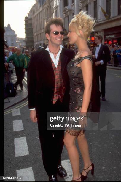 Television presenter and actress Emma Noble with boyfriend James Major at the BAFTA TV Awards, circa 1998.