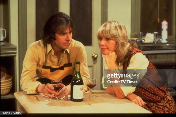 Actors Richard O'Sullivan and Tessa Wyatt in character as Robin Tripp and Vicky Nicholls on the set of sitcom Robin's Nest, circa 1979.