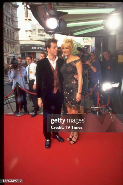 Television presenter and actress Emma Noble with boyfriend James Major at the BAFTA TV Awards, circa 1998.