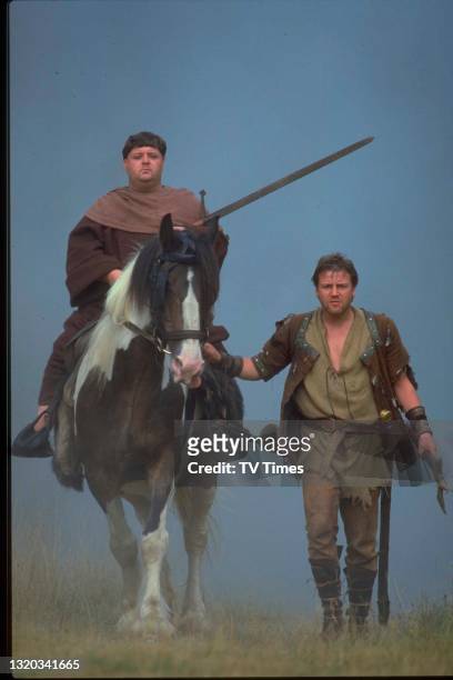 Actors Phil Rose and Ray Winstone in character as Friar Tuck and Will Scarlet while filming Robin Of Sherwood, circa 1984.