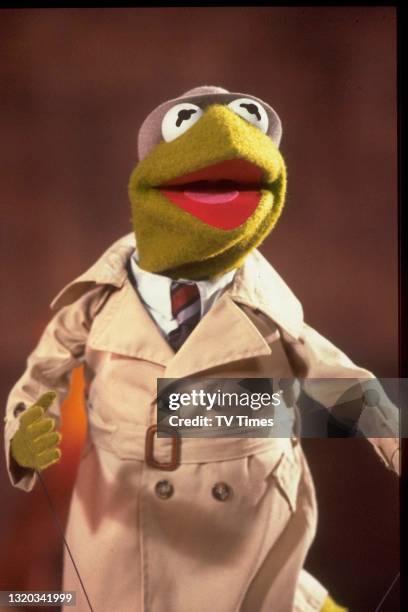 Puppet character Kermit The Frog dressed as a private detective on episode 414 of The Muppet Show, at Elstree Studios, Hertfordshire, circa 1979.