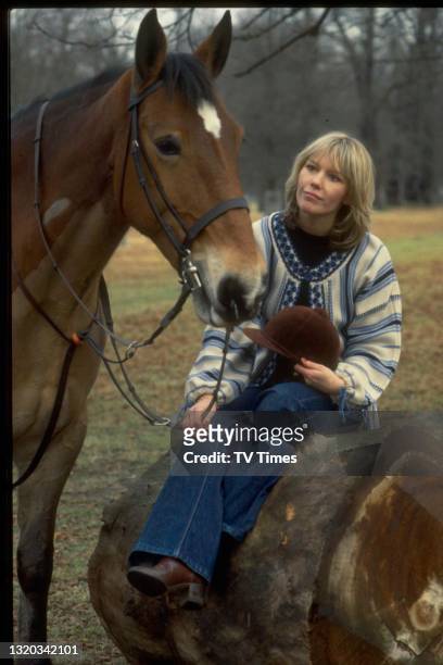 Actress Tessa Wyatt photographed with her horse, circa 1979.