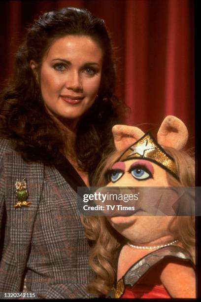 Wonder Woman actress Lynda Carter with Miss Piggy on the set of The Muppet Show at Elstree Studios, Hertfordshire, circa 1980.