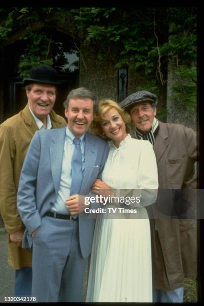 Tommy Cooper, Richard Briers, Sylvia Sims and Eric Sykes in character on the set of sitcom It's Your Move, circa 1982.