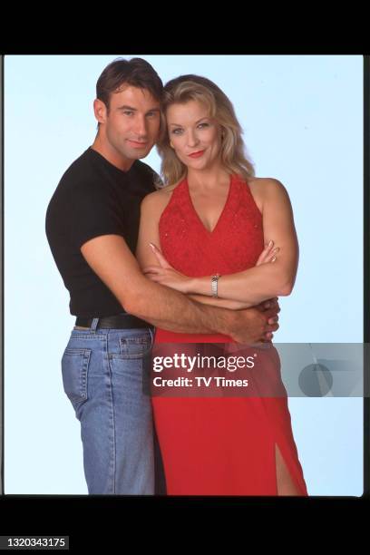 Actors Claire King and Paul Opacic in character as Kim Tate and Steve Marchant for television soap Emmerdale, circa 1997.