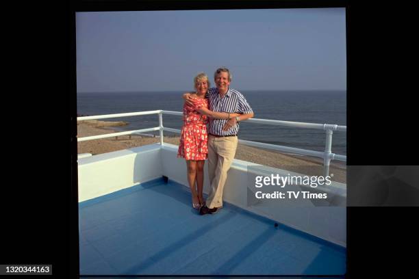 Journalist and broadcaster Derek Jameson with his wife Ellen, circa 1990.