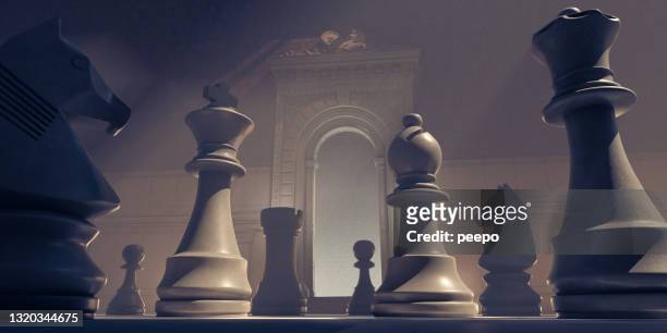 huge chess pieces within an ornate old building - bishop chess stock pictures, royalty-free photos & images