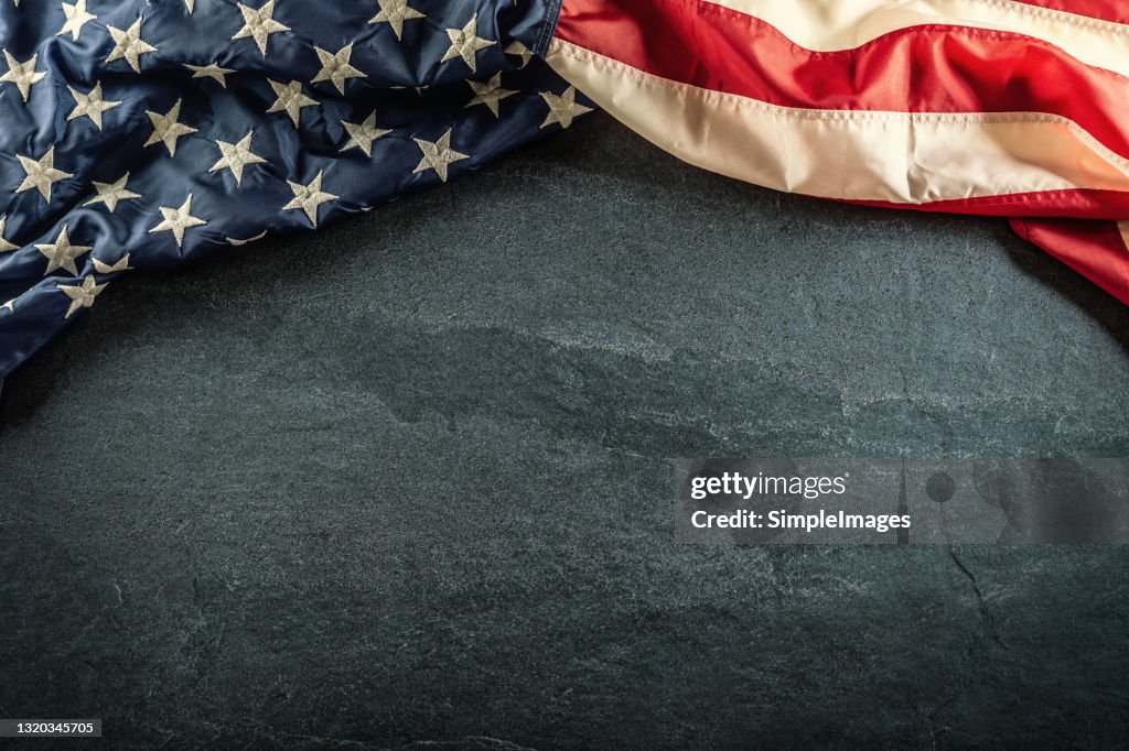 USA flag on grey background with copy space.