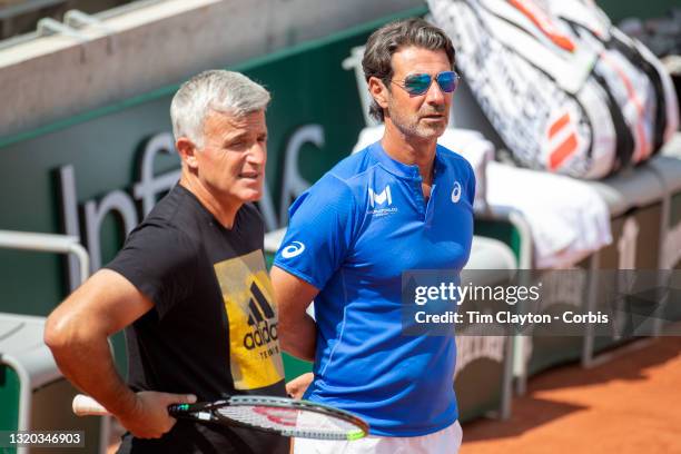 May 27. Apostolos Tsitsipas and Patrick Mouratoglou, coaches of Stefanos Tsitsipas of Greece watching him practice against Dominic Thiem of Austria...