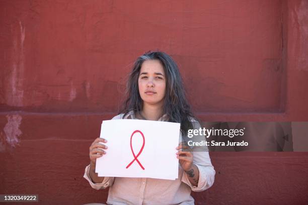 young activist woman portrait - hiv stock pictures, royalty-free photos & images