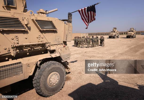 Army soldiers prepare to go out on patrol from a remote combat outpost on May 25, 2021 in northeastern Syria. U.S. Forces, part of Task Force WARCLUB...
