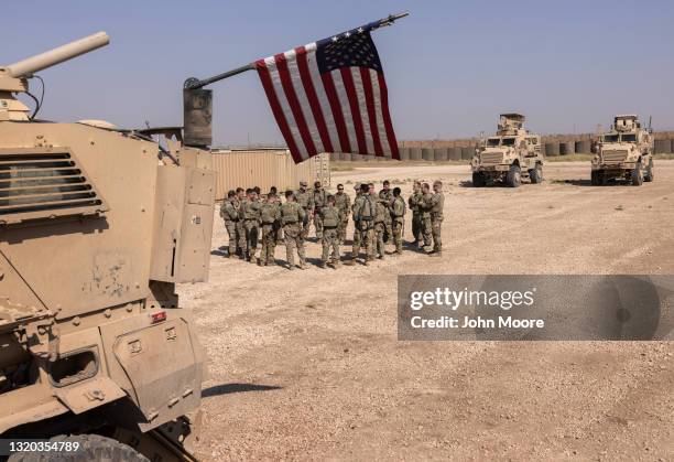 Army soldiers prepare to go out on patrol from a remote combat outpost on May 25, 2021 in northeastern Syria. U.S. Forces, part of Task Force WARCLUB...