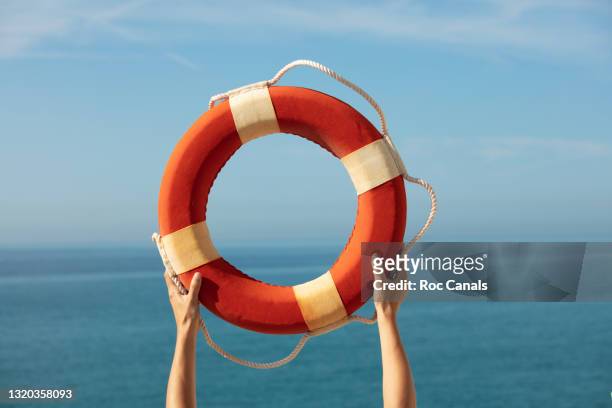 lifeguard float - protection stockfoto's en -beelden