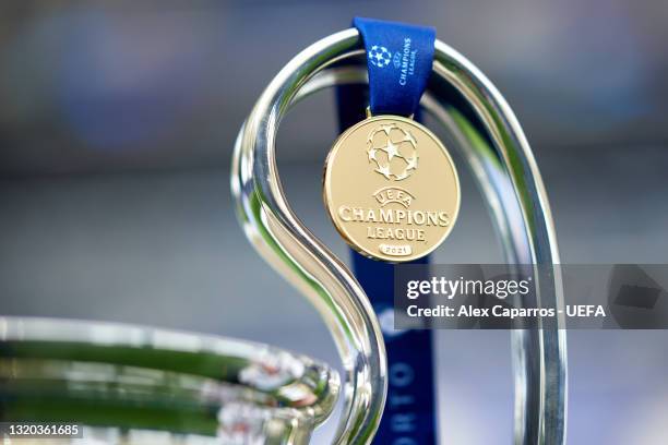 Champions League winners' medal is seen next to the trophy ahead of the UEFA Champions League Final between Manchester City and Chelsea FC at Estadio...