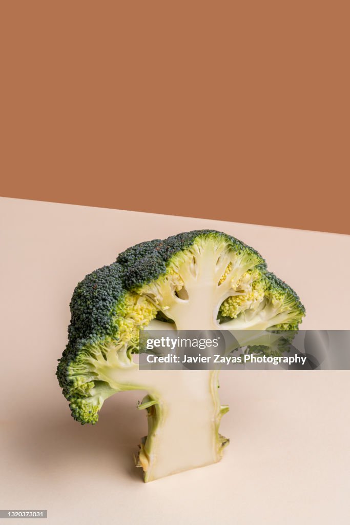 Close-Up Of Sliced Broccoli Against Pastel Background
