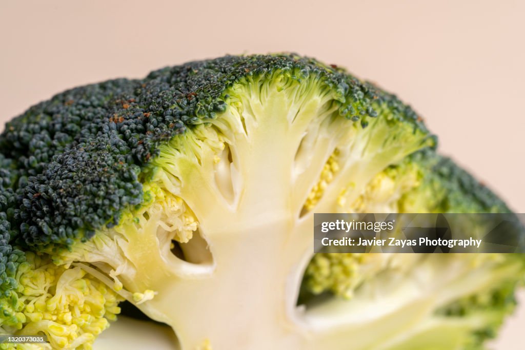 Close-Up Of Sliced Broccoli Against Pastel Background