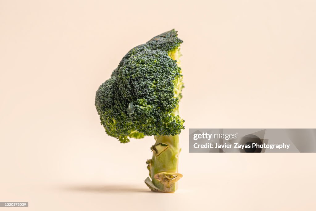 Close-Up Of Sliced Broccoli Against Pastel Background