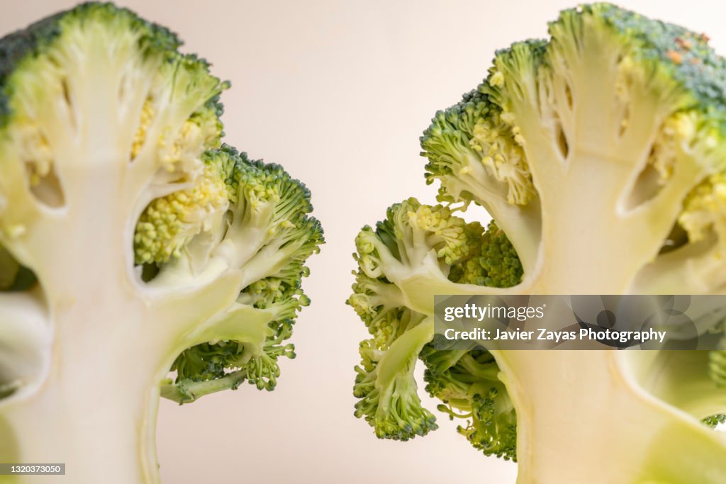 Close-Up Of Sliced Broccoli Against Pastel Background