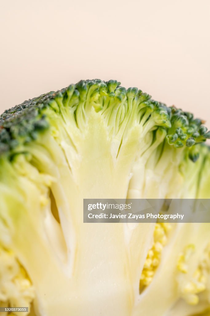 Close-Up Of Sliced Broccoli Against Pastel Background