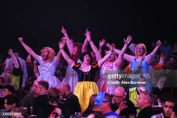 Fans in fancy dress show their support during Night 16 of the Unibet Premier League Darts at Marshall Arena on May 27, 2021 in Milton Keynes, England.