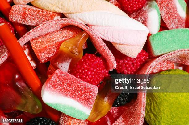 close up view of a high quality close up image of a set of gummy candies. - gummy snoep stockfoto's en -beelden