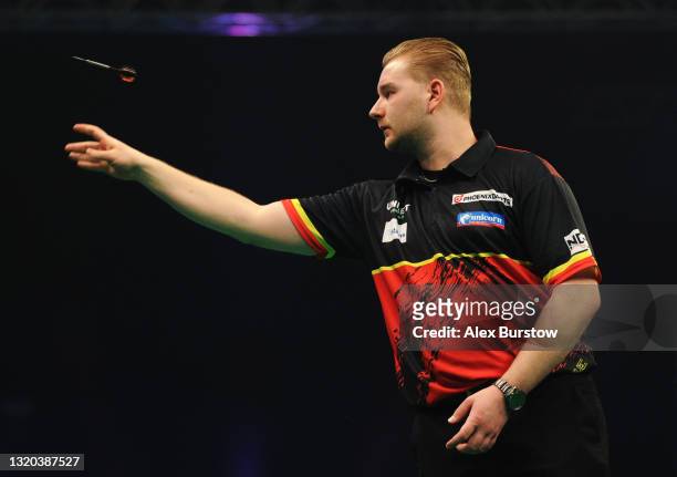 Dimitri Van den Bergh of Belgium in action in his match against Jonny Clayton of Wales during Night 16 of the Unibet Premier League Darts at Marshall...