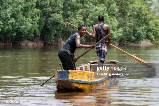 clam (shell) diving on the lower congo river - woman fisherman stock pictures, royalty-free photos & images