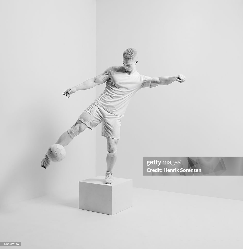 White statue in white room