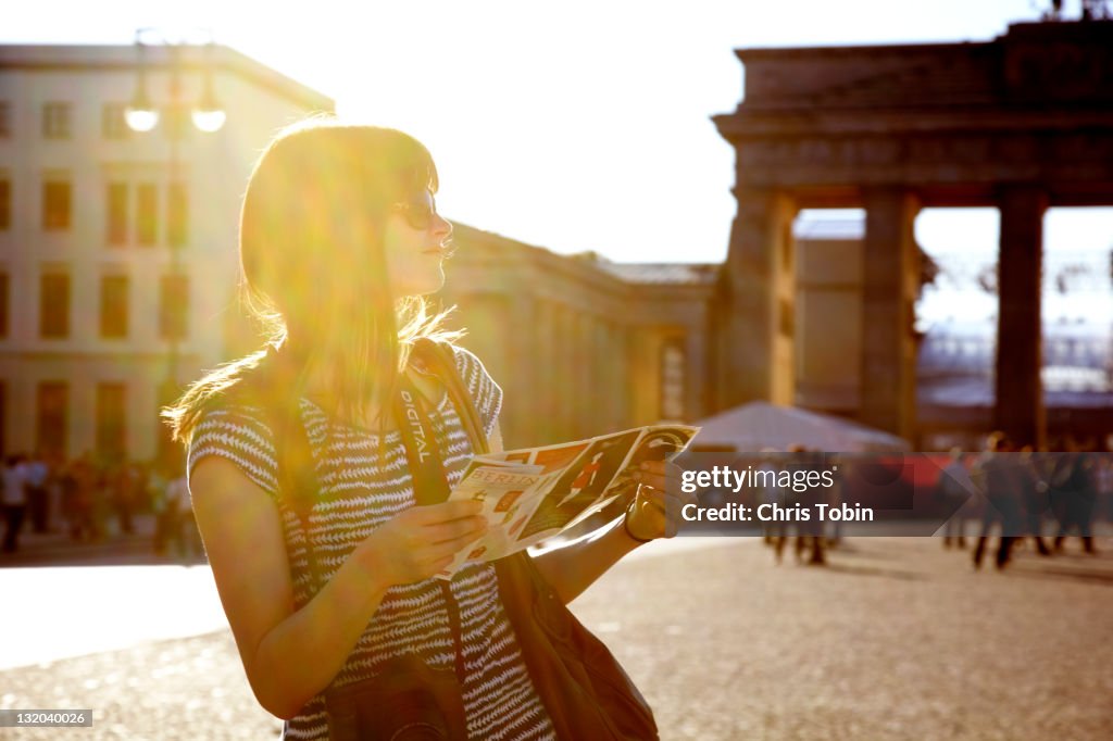Girl with map at Brandenburger Tor