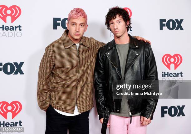 Tyler Joseph and Josh Dun of music group Twenty One Pilots attends the 2021 iHeartRadio Music Awards at The Dolby Theatre in Los Angeles, California,...