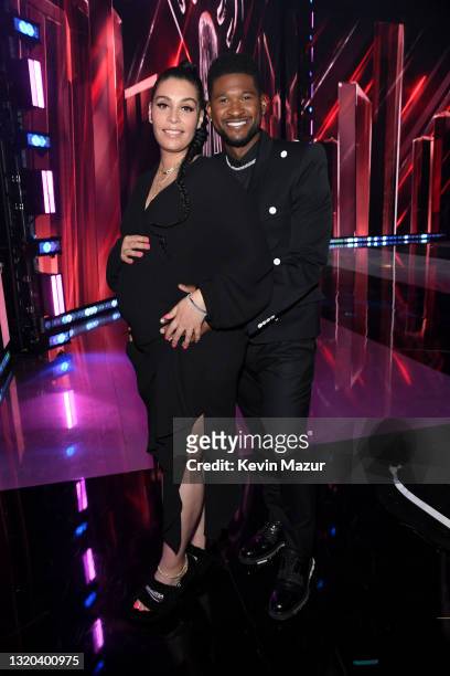 Jennifer Goicoechea and Usher attend the 2021 iHeartRadio Music Awards at The Dolby Theatre in Los Angeles, California, which was broadcast live on...