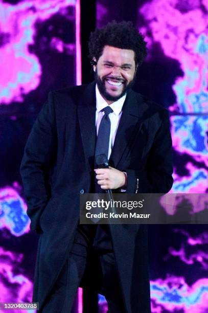 In this image released on May 27, The Weeknd performs onstage at the 2021 iHeartRadio Music Awards at The Dolby Theatre in Los Angeles, California,...