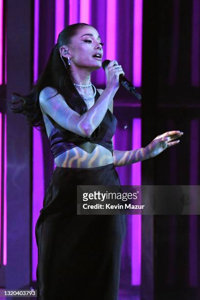 In this image released on May 27, Ariana Grande performs onstage at the 2021 iHeartRadio Music Awards at The Dolby Theatre in Los Angeles,...