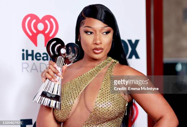 Megan Thee Stallion, winner of the Best Collaboration award for 'Savage' , attends the 2021 iHeartRadio Music Awards at The Dolby Theatre in Los...
