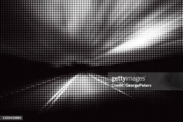 dot halftone pattern of highway at night - highway night stock illustrations